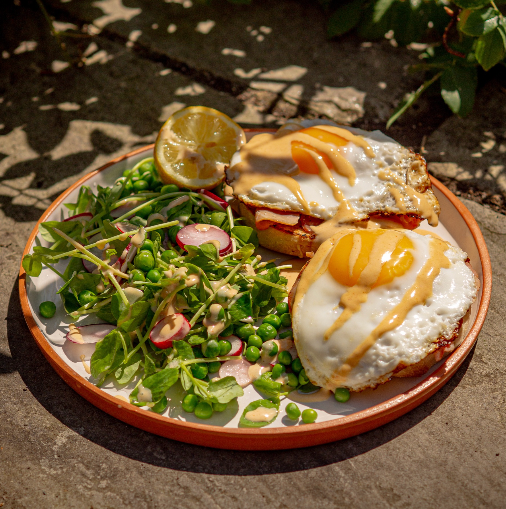Cheats Sriracha Eggs Benedict with Sweet Pea Salad